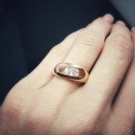  The red gold ring is decorated with two zircon holes 2